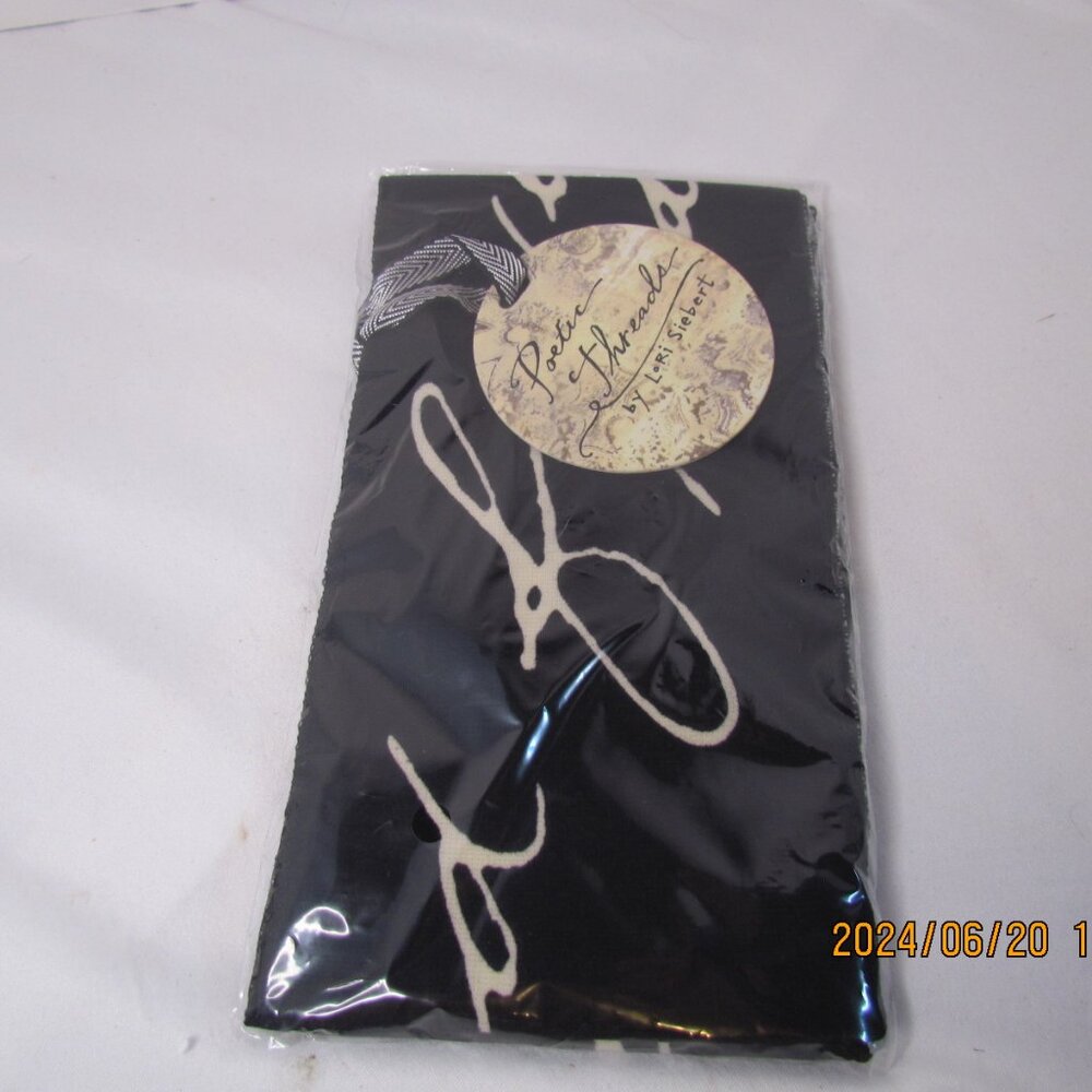 New in package Studio by Demdaco Skinny Scarves with Courage saying on it.